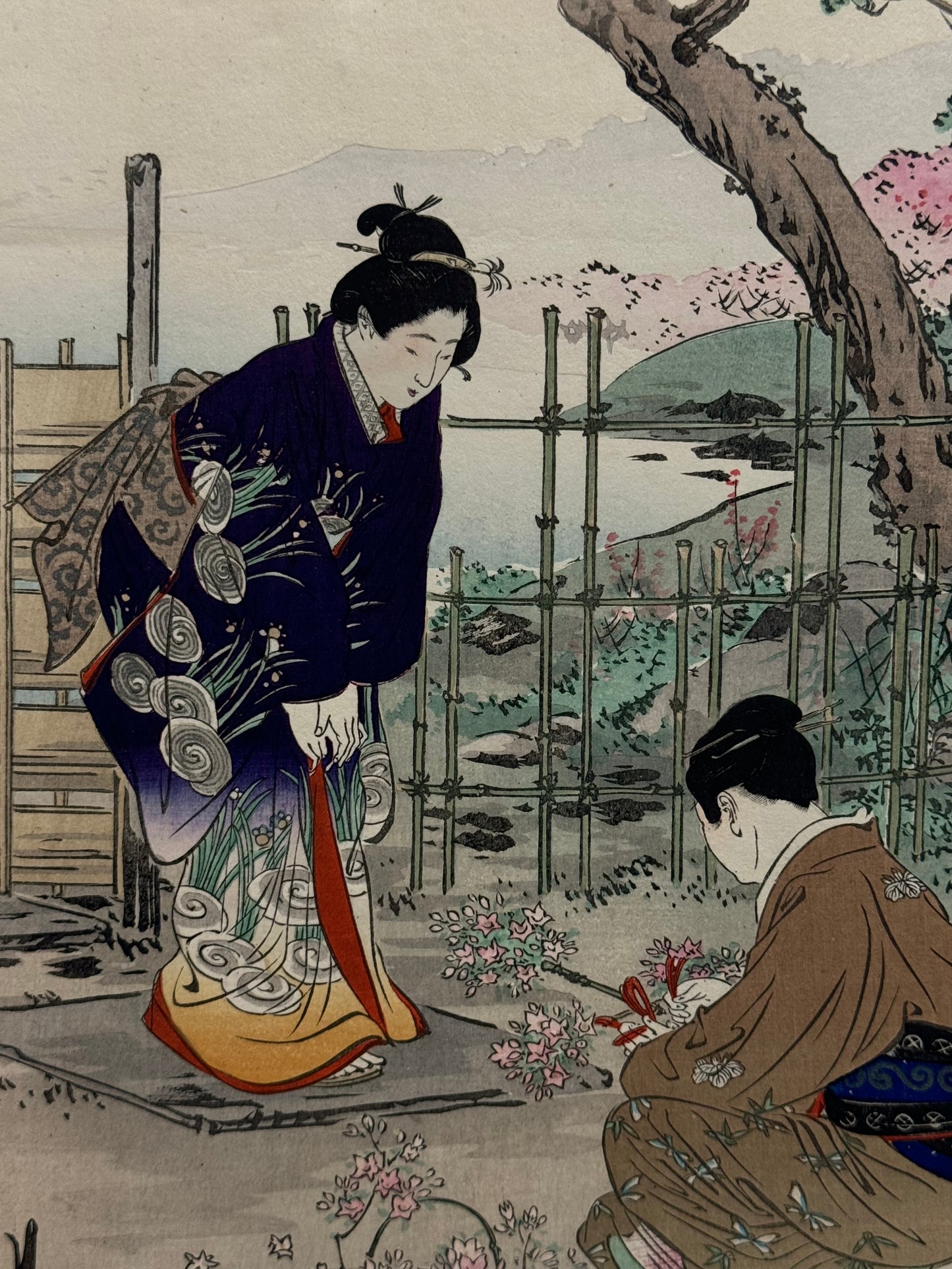 Complete silk bound album of 24 woodblock prints of “Bijin” by Gekko.- c1897