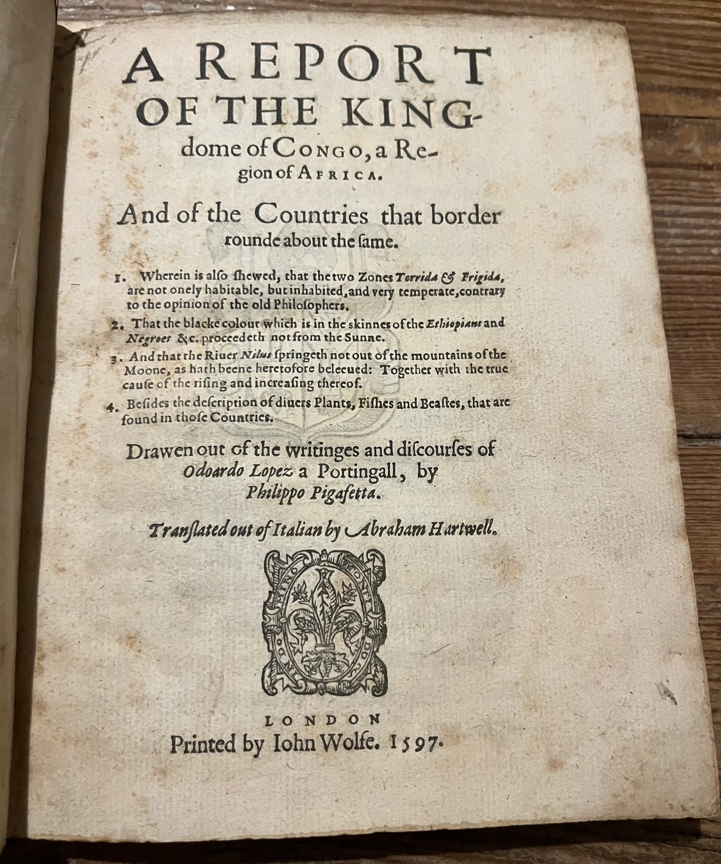 "A report of the kingdome of Congo, a region of Africa And of the countries that border rounde about the same" - 1597 - John Wolfe