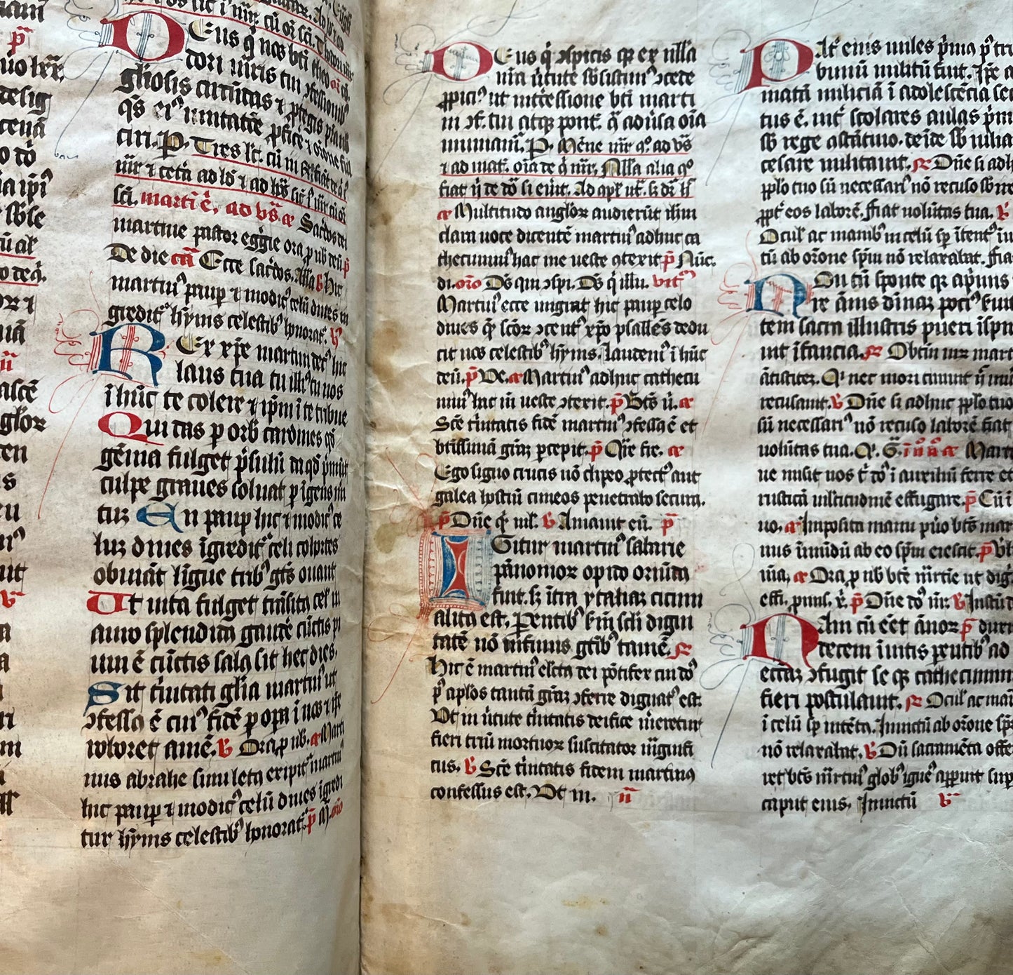 14th Century Missal Fragment of 28 leaves with beautiful decorative lettering