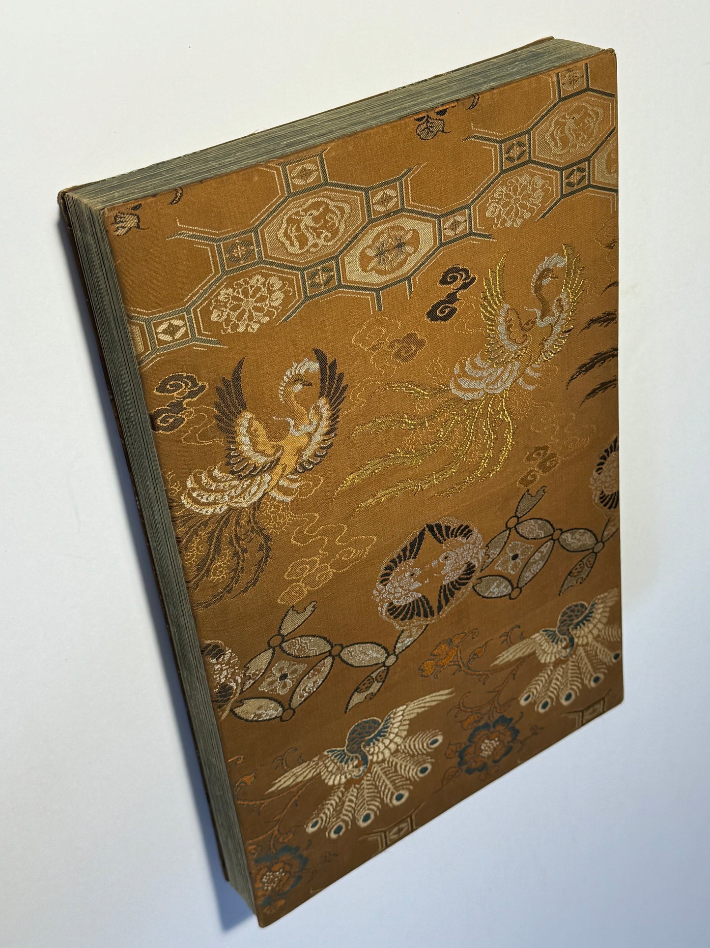 Beautiful silk bound album of Ukiyo-e Diptychs by Toyonobu - 1883 - "Newly Selected Records of the Taiko"