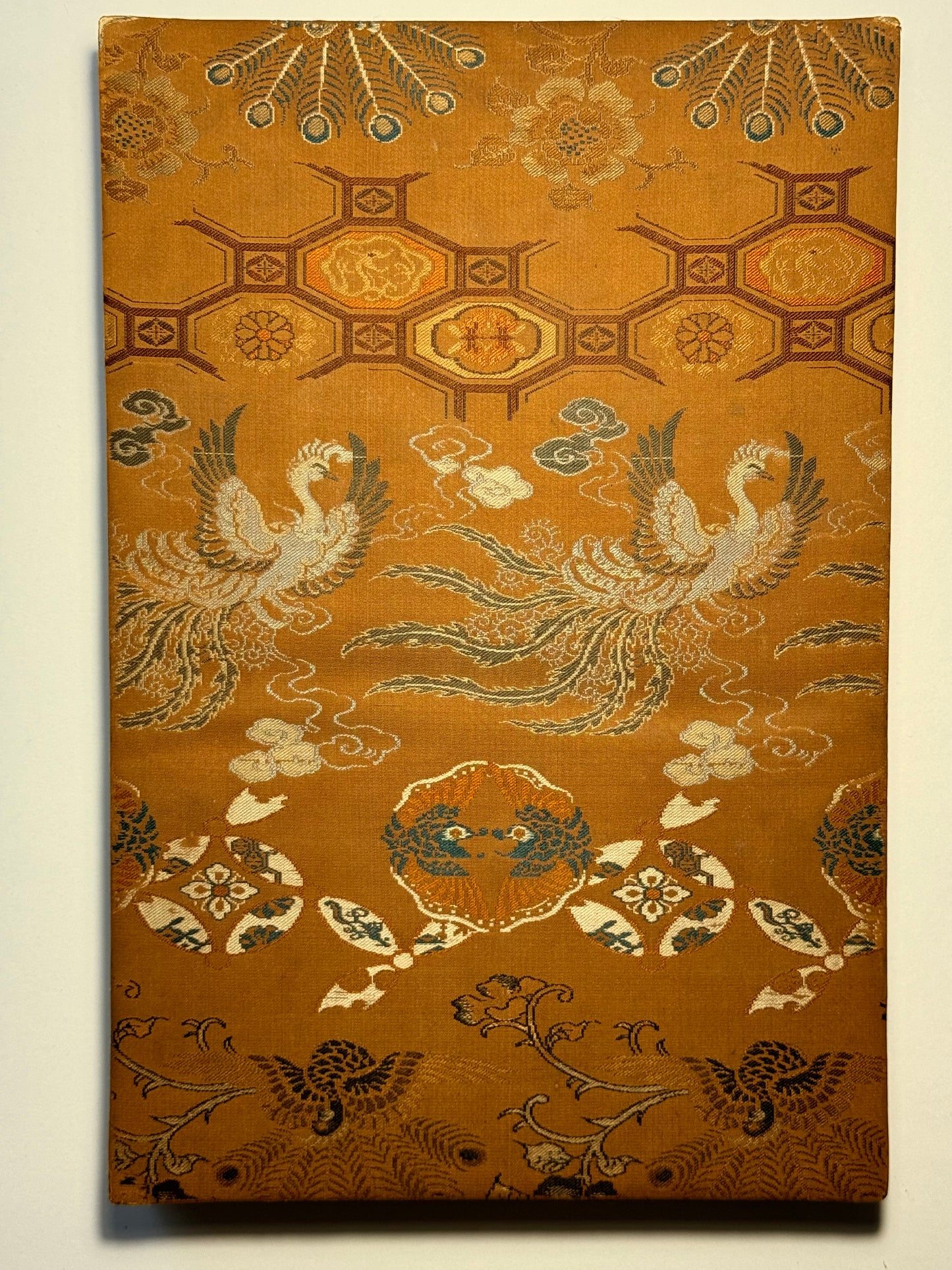 Beautiful silk bound album of Ukiyo-e Diptychs by Toyonobu - 1883 - "Newly Selected Records of the Taiko"
