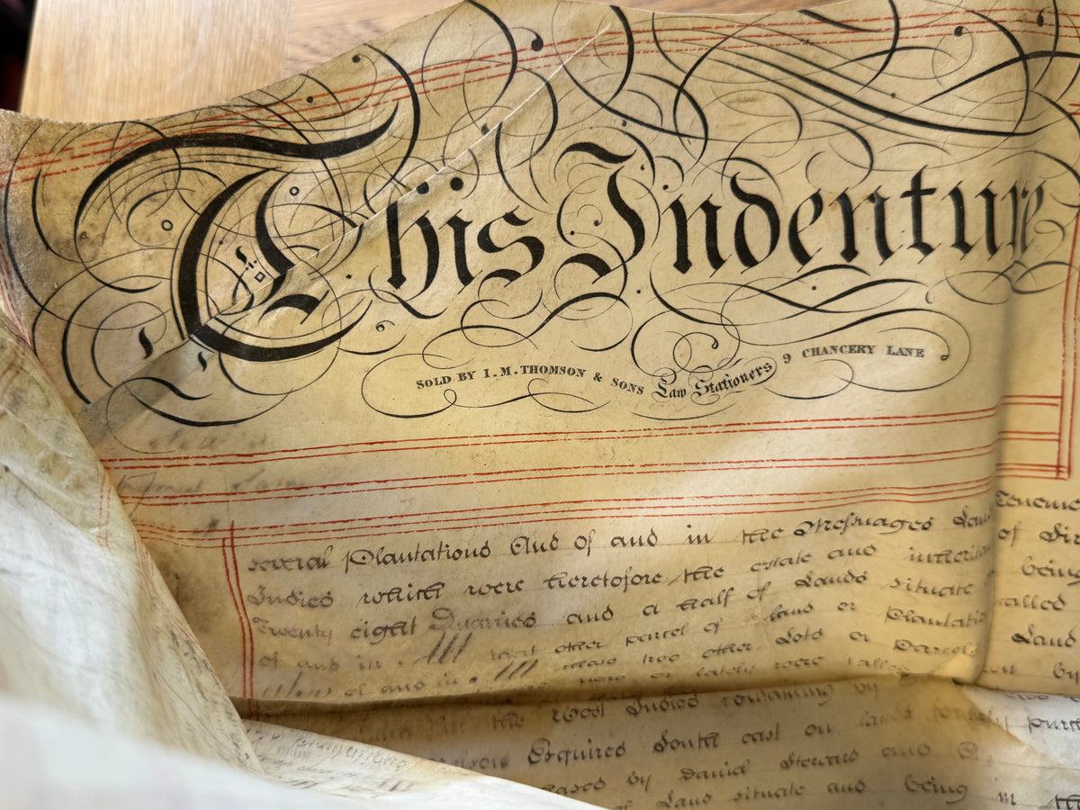 An archive of Nine vellum deeds documenting the enslaved populations of the Upper and Lower Pearl Estates in St Andrew's, Grenada, from 1826-1828, and their subsequent sale in 1830.